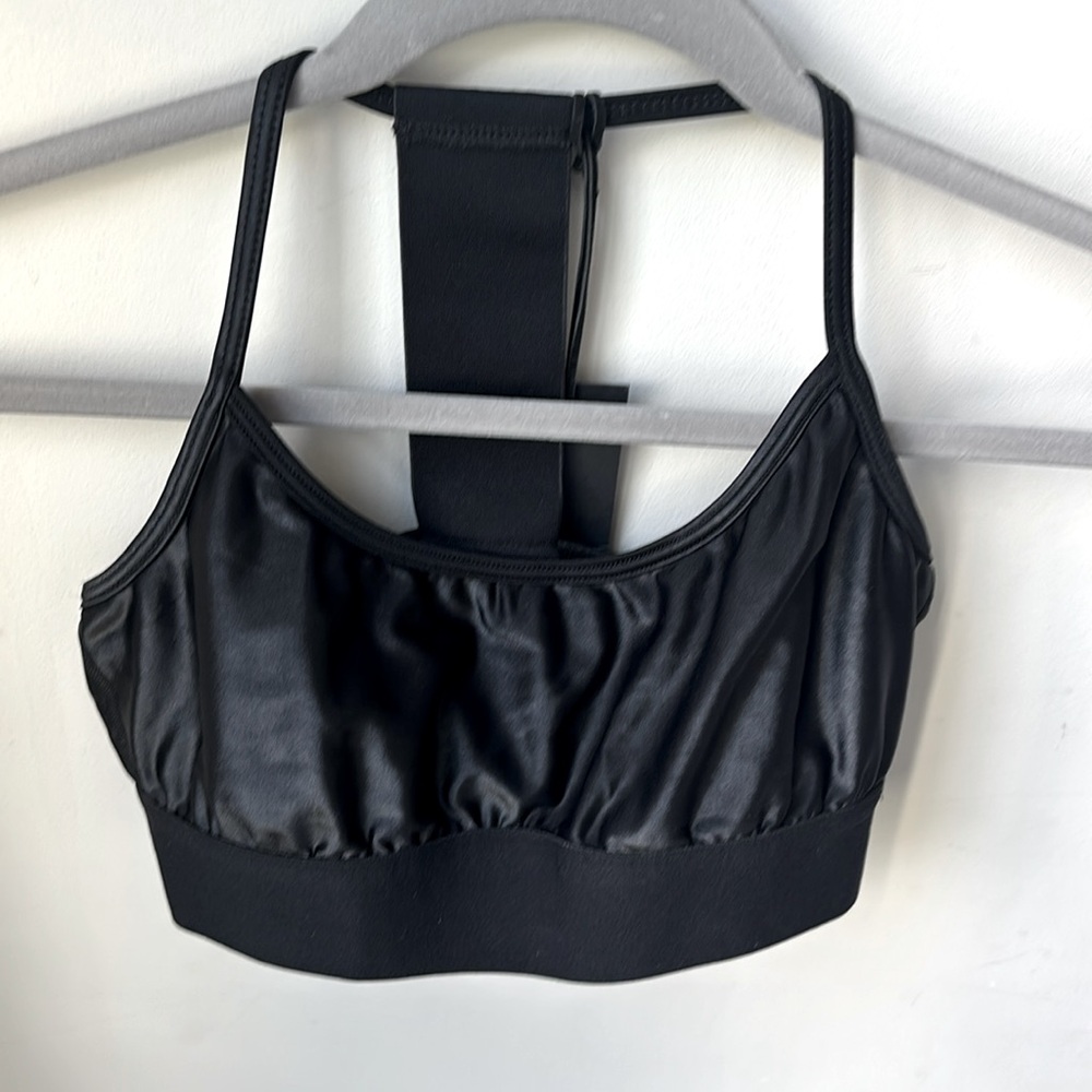 Noli liquid Black sports bra.  New with Tags